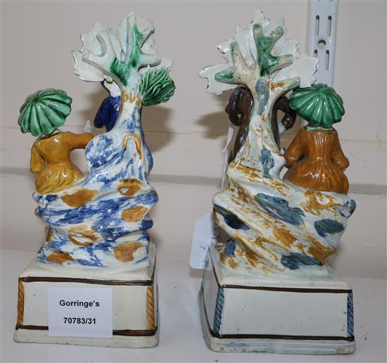 A pair of Pratt-type pearlware groups, c.1810, 21.5cm and 21cm, some high quality restoration
